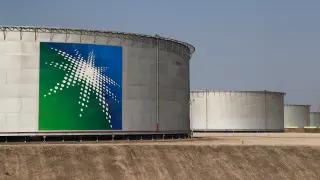 FILE PHOTO: A view shows branded oil tanks at Saudi Aramco oil facility in Abqaiq