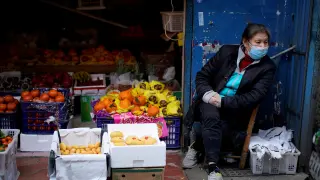 Una vendedora de fruta en Wuhan.