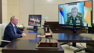 Russian President Putin meets with Chief of the Russian Armed Forces' General Staff Gerasimov via a video conference call, outside Moscow