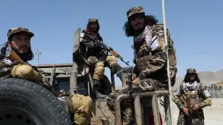 Members of the Taliban Intelligence Special Forces guard the military airfield in Kabul
