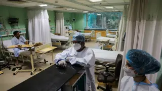 Healthcare workers are seen inside a ward for coronavirus disease (COVID-19) patients at Sir Ganga Ram Hospital in New Delhi