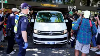 The scene outside the hotel where tennis player Novak Djokovic is believed to be in Melbourne