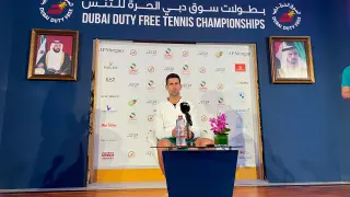 Novak Djokovic addresses a news conference ahead of his campaign at the Dubai Duty Free Tennis Championships