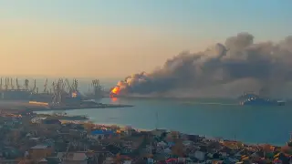 Smoke billows from a fire on what Ukrainian Ministry of Defence says is a Russian ship, as Russia's invasion of Ukraine continues, at the port of Berdiansk, Ukraine, March 24, 2022 in this still image obtained from a social media video. Kirillovka.ks.ua/Handout via REUTERS ATTENTION EDITORS - THIS IMAGE HAS BEEN SUPPLIED BY A THIRD PARTY. NO RESALES. NO ARCHIVES. MANDATORY CREDIT. UKRAINE-CRISIS/BERDIANSK-PORT