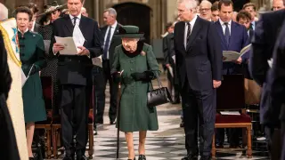 Britain's Queen Elizabeth, accompanied by Prince Andrew, Duke of York, attends a service of thanksgiving for late Prince Philip, Duke of Edinburgh, at Westminster Abbey in London, Britain, March 29, 2022. Richard Pohle/Pool via REUTERS BRITAIN-ROYALS/PHILIP-MEMORIAL