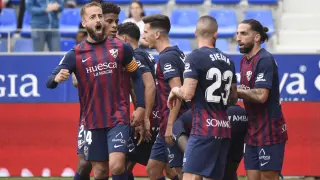 Los jugadores de la SD Huesca celebran el gol de Juan Carlos que les dio el triunfo ante el Leganés.