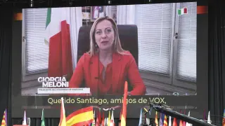 La líder ultraderechista italiana Giorgia Meloni en un video durante el evento de Vox en el que se ha presentado 'España decide' con motivo de la fiesta del partido, Viva 22, en Madrid, este domingo.