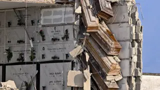 Naples cemetery collapse exposes bodies