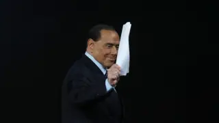 FILE - Italian former premier Silvio Berlusconi waves at the end of the Italian State RAI TV program "Che Tempo che Fa", in Milan, Italy, Sunday, Nov. 26, 2017. Berlusconi, the boastful billionaire media mogul who was Italy's longest-serving premier despite scandals over his sex-fueled parties and allegations of corruption, died, according to Italian media. He was 86. (AP Photo/Antonio Calanni, File) Associated Press/LaPresse Only Italy and Spain