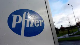 FILE PHOTO: A company logo is seen at a Pfizer office in Dublin