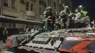 FILE - Members of the Wagner Group military company sit atop of a tank on a street in Rostov-on-Don, Russia, Saturday, June 24, 2023, prior to leaving an area at the headquarters of the Southern Military District. Wagner leader Prigozhin managed to get 200 kilometers (125 miles) from Moscow with little resistance. (AP Photo, File)