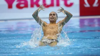 Dennis Gonzalez Boneu, of Spain, competes in the men's solo free final of artistic swimming at the World Swimming Championships in Fukuoka, Japan, Wednesday, July 19, 2023. He finished first to win the gold medal. (AP Photo/Nick Didlick)
