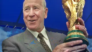 FILE PHOTO: FIFA AMBASSADOR AND ENGLAND SOCCER LEGEND BOBBY CHARLTON HOLDS UP FIFAWORLD CUP TROPHY IN YOKOHAMA.