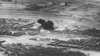 This image from video provided by the Department of Defense shows a Nov. 8, 2023, airstrike on a weapons warehouse. center, in eastern Syria. The strike targeted a facility linked to Iranian-backed militias, in retaliation for what has been a growing number of attacks on bases housing U.S. troops in the region for the past several weeks. (Department of Defense via AP)