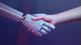 Las máquinas y los humanos se dan la mano en la inteligencia artificial.