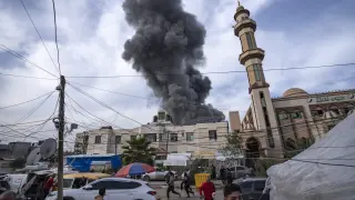 Smoke rises following an Israeli bombardment on Rafah, southern Gaza Strip, Wednesday, Dec. 20, 2023. (AP Photo/Fatima Shbair)