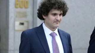 FILE - FTX founder Sam Bankman-Fried leaves Federal court on July 26, 2023, in New York. The former crypto mogul faces the potential of decades in prison when he is sentenced Thursday, March 28, 2024, for his role in the 2022 collapse of FTX, once one of the world's most popular platforms for trading digital currency. (AP Photo/Mary Altaffer, File)