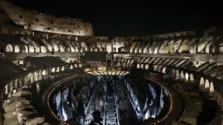 Rome (Italy), 29/03/2024.- The Colosseum is illuminated on occasion of the Via Crucis (Way of the Cross) torchlight procession of Good Friday in Rome, Italy, 29 March 2024. Pope Francis will preside over the Via Crucis (Way of the Cross) torchlight procession on Good Friday in front of Rome's Colosseum. Good Friday is observed by Christians around the world to commemorate the crucifixion of Jesus Christ. (Papa, Italia, Roma) EFE/EPA/FABIO FRUSTACI
