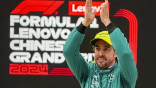 Aston Martin driver Fernando Alonso of Spain waves following his third place finish in qualifying at the Chinese Formula One Grand Prix at the Shanghai International Circuit, Shanghai, China, Saturday, April 20, 2024. (AP Photo/Andy Wong)
