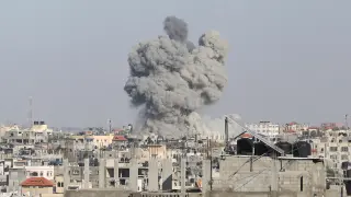 Smoke rises following Israeli strikes, amid the ongoing conflict between Israel and the Palestinian Islamist group Hamas, in Rafah