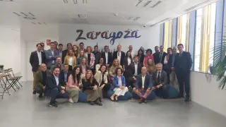 Miembros de la empresa Zelenza y clientes, este jueves en el acto de inauguración oficial de las oficinas en el parque empresarial de la Expo.