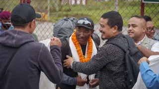 FILE- Veteran Sherpa guide Kami Rita returning after scaling Mount Everest for the 28th time arrives at the airport in Kathmandu, Nepal, May 25, 2023. Kami Rita, one of greatest climbing guides on Mount Everest has scaled the world's highest peak for the 29th time, breaking his own record for most times to the summit, expedition organizers said Sunday, May 12, 2024.(AP Photo/Niranjan Shrestha, File)