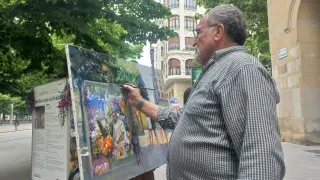 Ricardo Lamenca, pintando en el paseo de la Independencia de Zaragoza.