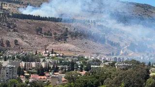 Smoke is seen following rockets that were fired towards Israel from Lebanon