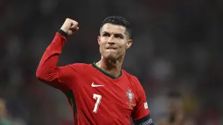 Portugal's Cristiano Ronaldo raises a fist after a Group F match between Portugal and Czech Republic at the Euro 2024 soccer tournament in Leipzig, Germany, Tuesday, June 18, 2024 (Robert Michael/dpa via AP)