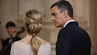 Spain's Prime Minister Pedro Sanchez and his wife Begona Gomez attend commemorations marking the 10th anniversary of the proclamation of Spain's King Felipe VI at Royal Palace in Madrid, Spain, Wednesday June 19, 2024. (Juan Medina/Pool Photo via AP)
