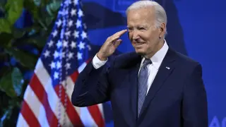 President Joe Biden exits the stage after speaking at the 115th NAACP National Convention on Tuesday, July 16, 2024, in Las Vegas. (AP Photo/David Becker)