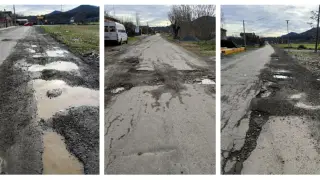 Socavones y mal estado del firme de la carretera A-2205 a su paso por Margudgued (Boltaña).