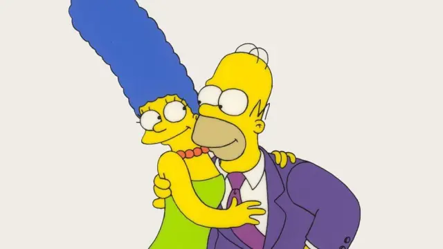 Homer Simpson y su esposa, protagonistas de la serie de animación.