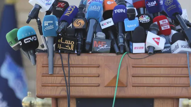 Osama Rabie, Chairman of the Suez Canal Authority, talks during a news conference in Suez