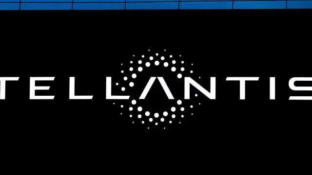 FILE PHOTO: The logo of Stellantis is seen on a company's building in Velizy-Villacoublay near Paris, France, Feb. 23, 2022. REUTERS/Gonzalo Fuentes/File Photo