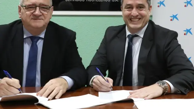 Firma del acuerdo entre Horeca y CaixaBank.