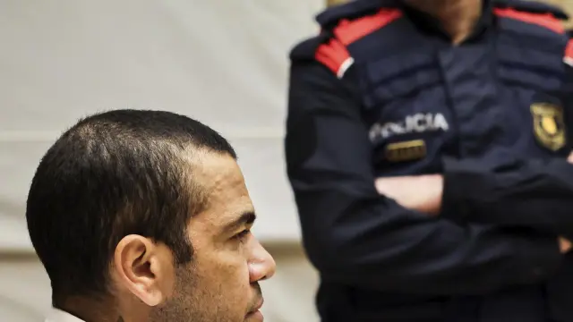 FILE - Brazilian soccer star Dani Alves sits during his trial in Barcelona, Spain, Monday, Feb. 5, 2024. Alves has been found guilty on Thursday Feb. 22, 2024 of sexually assaulting a young woman in a Barcelona nightclub. A three-judge panel sentenced Alves on Thursday to four years and six months. The 40-year-old Alves denied any wrongdoing during a trial that took place over three days this month. The decision can be appealed. (Jordi Borras/Pool Photo via AP, File)