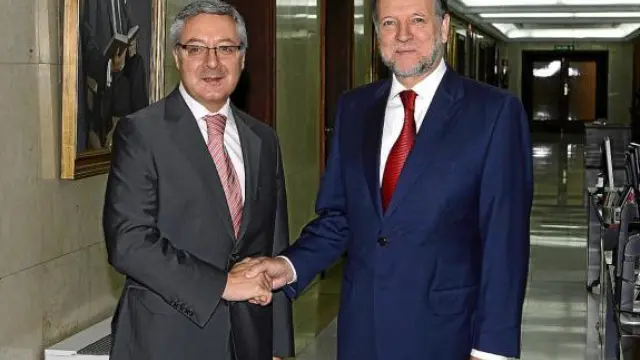 El ministro José Blanco y el presidente Marcelino Iglesias, ayer en Madrid.