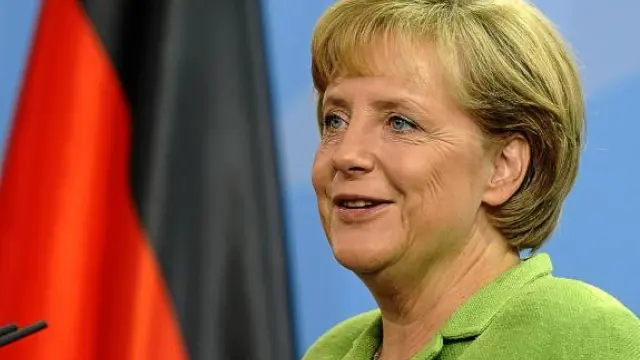 Merkel no ocultó su alegría el jueves al anunciar el visto bueno de GM a la oferta de Magna.