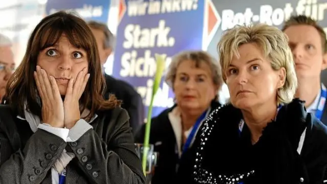 Simpatizantes de la CDU de Angela Merkel tras conocer los resultados electorales.