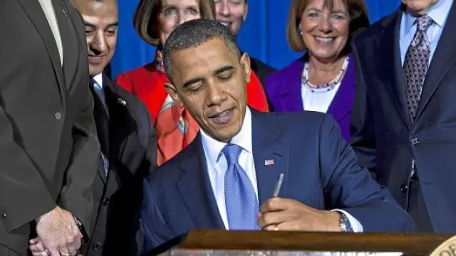 Obama firma la abolición de la ley 'Don't Ask, Don't Tell' (No preguntes, no digas), ayer.