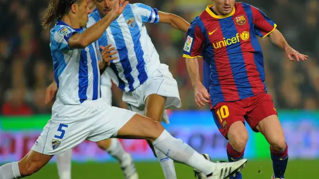 Messi se marcha de Demichelis en el encuentro ante el Málaga, el domingo pasado