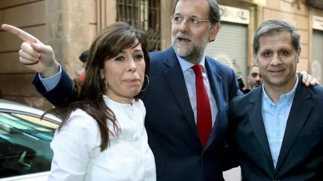 Mariano Rajoy, junto a Alicia Sánchez-Camacho y Alberto Fernández Díaz, ayer en Barcelona.
