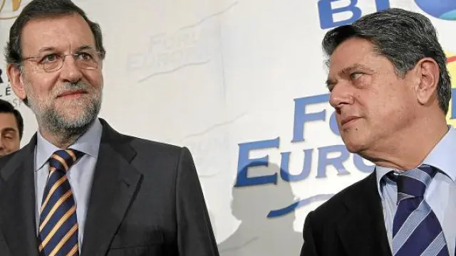 Mariano Rajoy y Federico Trillo, ayer en el desayuno informativo del Foro Europa.