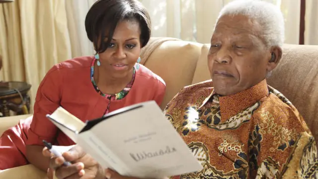 Michelle Obama junto al nobel de la Paz