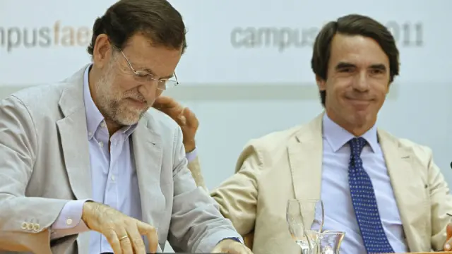 Mariano Rajoy y José María Aznar en el acto de FAES