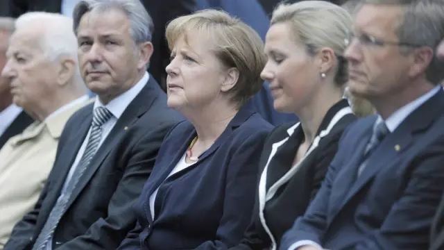 La canciller Angela Merkel y el presidente Christian Wulff