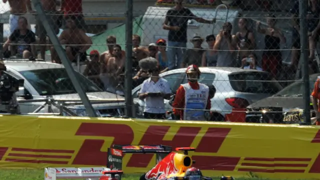 Fernando Alonso y Sebastian Vettel en el circuito de Monza este domingo