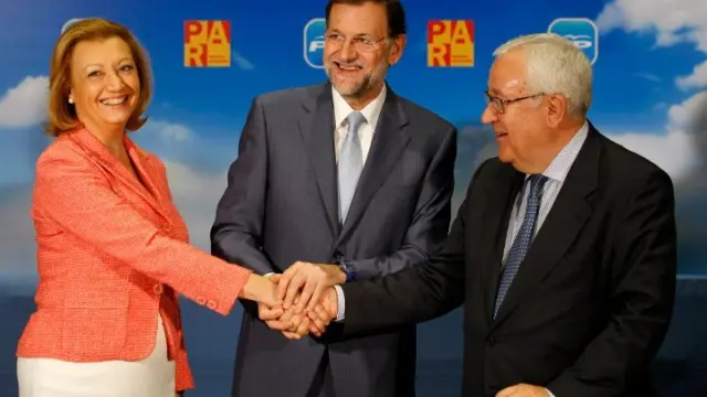 Luisa Fernanda Rudi, Mariano Rajoy y José Ángel Biel este lunes en Zaragoza