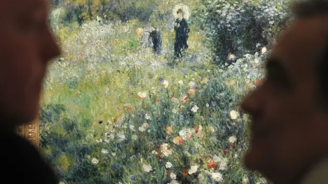 'Mujer con sombrilla en un jardín', de Renoir